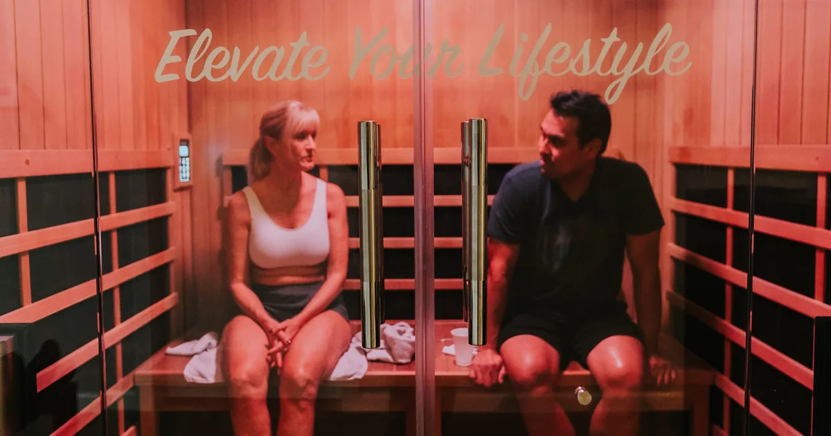 Woman relaxing in an infrared sauna at iCRYO St. Johns, FL