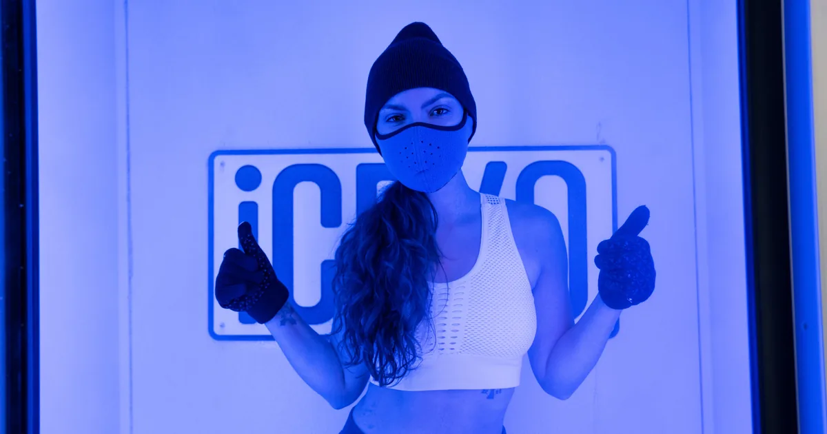 Energized client after a whole-body cryotherapy session at iCRYO St. Johns