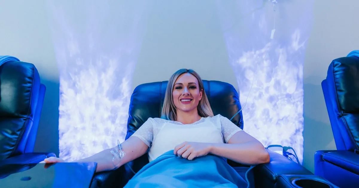 Client receiving IV hydration therapy for energy at iCRYO St. Johns
