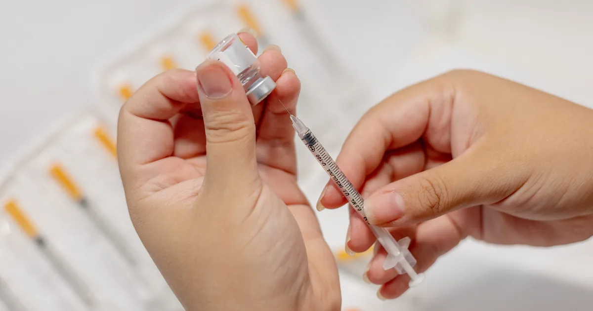 Provider reviewing a physician-supervised peptide protocol with a client at iCRYO St. Johns