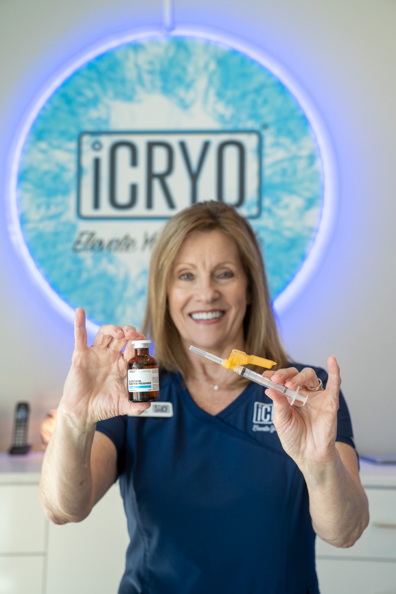 iCRYO St Johns registered nurse holding an IM shot vial and syringe